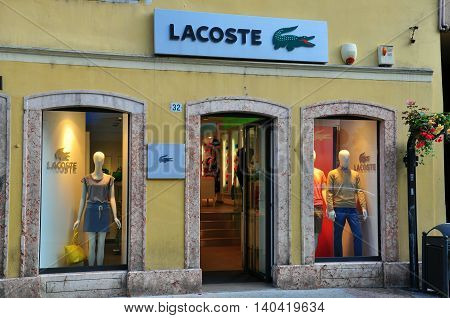 TRENTO ITALIA - JUNE 21: Facade of Lacoste store in Trento on June 21; 2014. Lacoste is a French clothing company founded in 1933.