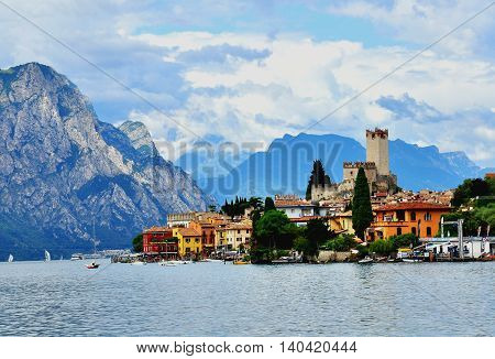 MALCESINE ITALY - JULY 27: View of Malcesine historical town on Garda lake Italy on July 27 2014. Malcesine is a resort on northern part of Garda lake in Italy.