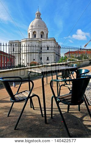 Cafe table and pantheon of Lisbon, Portugal