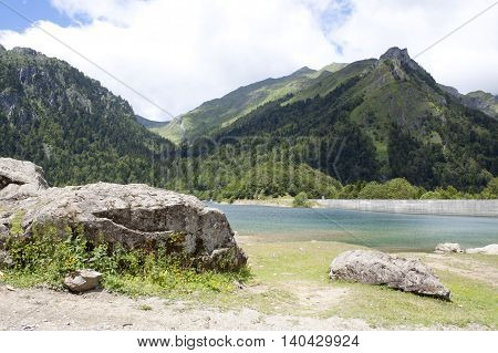 Lake Between Mountains And Stones In The Ayous Lakes, Pyrenees, France
