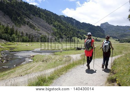 mountaineers hiking in the Ayous Lakes Pyrenees France