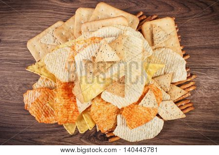 Heap Of Salted Crisps, Breadsticks And Cookies, Concept Of Unhealthy Food