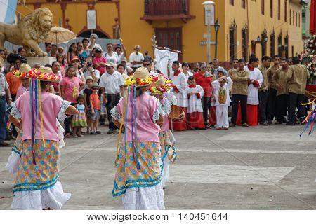 Leon Nicaragua - December 12 2015: Aborigen dancers in typical dress celebrating on the street