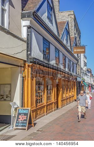 Bury St Edmunds/UK. 18th July 2016. An old street with mixed retail and food establishments close to the Abbey Gardens.