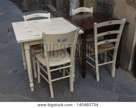 Tables and chairs of a dehors alfresco bar restaurant pub