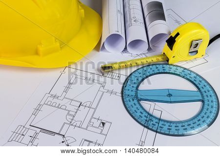 An office desk with the project papers