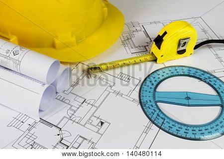 An office desk with the project papers