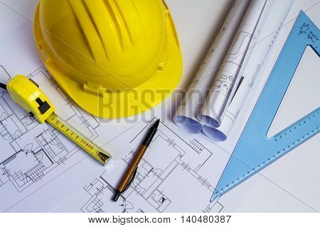 An office desk with the project papers