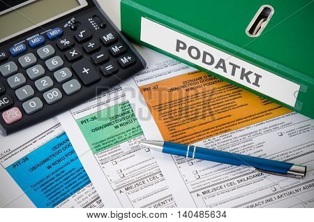 Close Up Of Polish Income Tax Forms On Desk