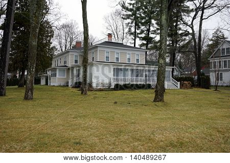 WEQUETONSING, MICHIGAN / UNITED STATES - DECEMBER 22, 2015: A large home on Beach Drive in Wequetonsing, Michigan.