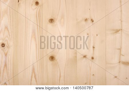 Wood panel background made of untreated wood.