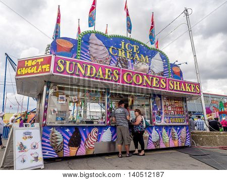 CALGARY, CANADA - JULY 9: Confection booth at the the Calgary Stampede midway on July 9, 2016 in Calgary, Alberta. The Calgary Stampede is often called the greatest outdoor show on Earth.