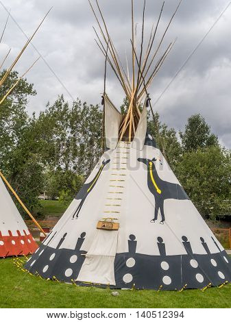 CALGARY, CANADA - JULY 9: View of Tipis in the Indian Village at the Calgary Stampede on July 9, 2016 in Calgary, Alberta. The Indian Village represents First Nations people at the Calgary Stampede.