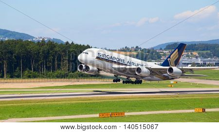 ZURICH - July 30:  A-380 Singapore Airlines taking off at Zurich Airport on July 30, 2016 in Zurich, Switzerland. Zurich airport is home port for Swiss Air and one of the european hubs.