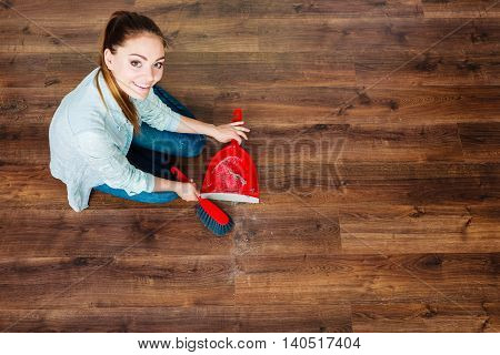 Cleaning Woman Sweeping Wooden Floor