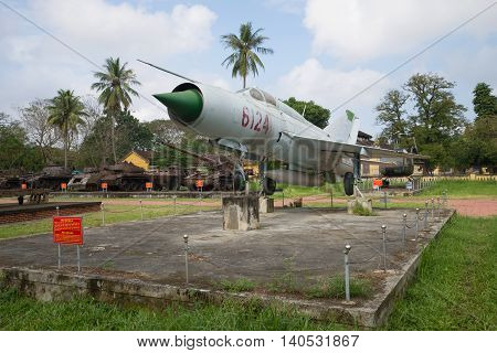 HUE, VIETNAM - JJANUARY 08, 2016: The Soviet MIG-21 in the city of Hue on a cloudy day. Historical landmark of the  Vietnam