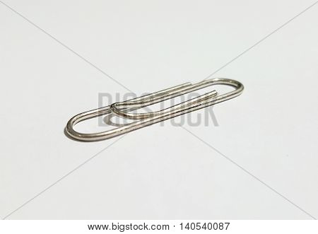 one paper clip put on white background