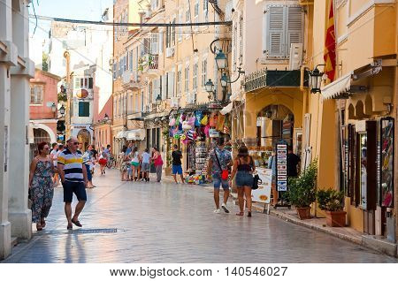 CORFU-AUGUST 22: Kerkyra old town with the row of souvenirs shops on August 22 2014 on Corfu island Greece.