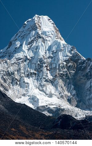 Summit of Ama Dablam from trekking route to Everest Pangboche Solukhumbu Nepal.