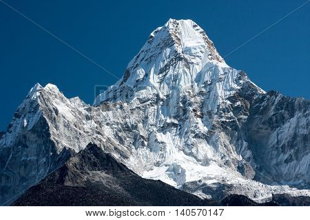 Summit of Ama Dablam from trekking route to Everest Pangboche Solukhumbu Nepal.