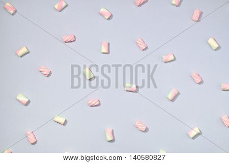 Sweet marshmallows minimalism set on pastel light blue background