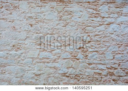 Brick wall background. graphic resource. ancient wall typical of the province of Ragusa places of Montalbano. Holiday sights and cultural tourism.
