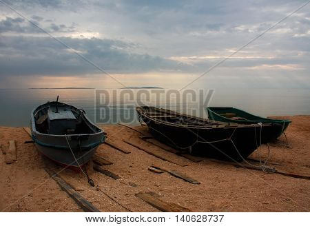 Fishing boats on the shore of the Azov Sea Kazantip Bay
