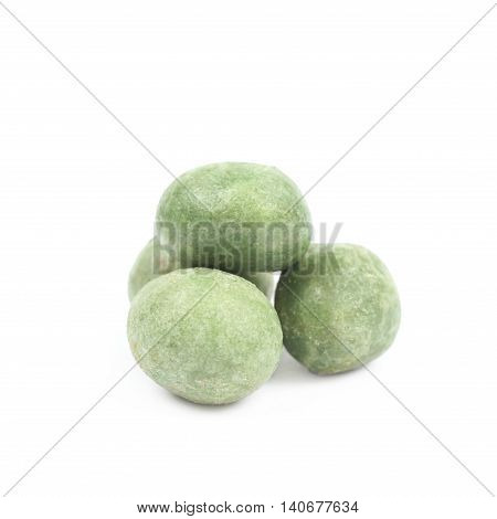 Green wasabi coated peanuts isolated over the white background