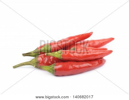 Pile of red italian peppers isolated over the white background