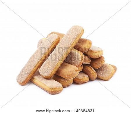 Pile of multiple ladyfinger savoiardi biscuit cookies, composition isolated over the white background