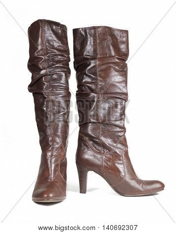 Brown leather high heels, womes shoes on white.
