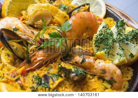 tradirional spanish cuisine paella with shrimps and vegetables