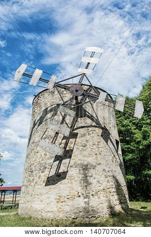 Old tower windmill in Holic Slovak republic. Architectural theme. Vertical composition. Cultural heritage. Beautiful object. Travel destination.