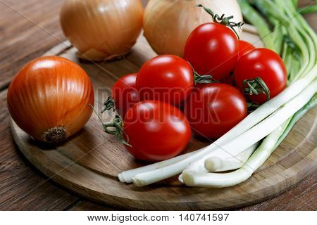 Onions Napiform Tomatoes On An Old Rural Table