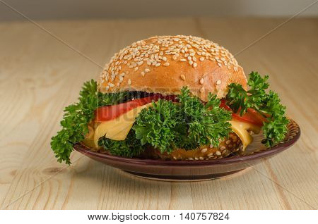 Sandwich with Sandwich with cheese tomato parsley on the wooden desk