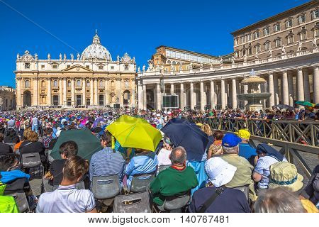 Rome, Italy - June 18, 2016: Pope Francesco speaking to people in Piazza San Pietro for jubilee event. On background, the popular landmark of St. Peter's Basilica.