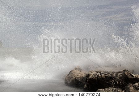 Breaking waves on rocks on the Adriatic Sea.