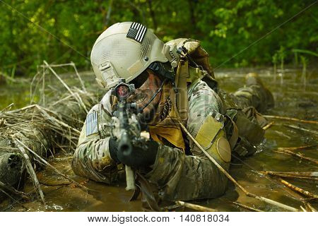 Green Berets US Army Special Forces Group soldier in action