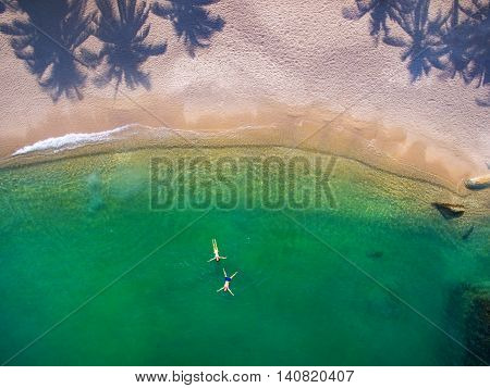 People on the beach by aerial view