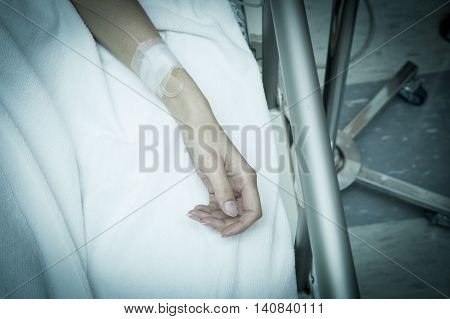 a hand of a patient during a surgical operation - closeup