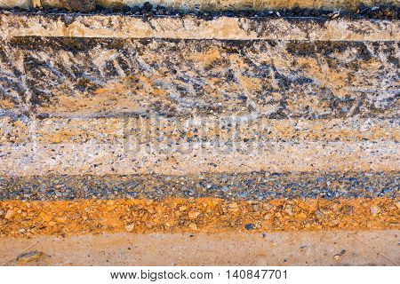Layers soil and rock of traffic road Layer soil paving Layer of crush rock.