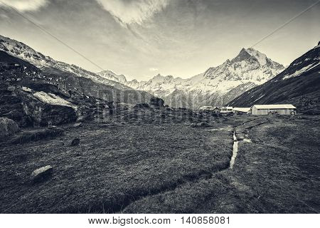 View of the himalayan peak the 6993 ms. mount Machhapuchhare-Fish Tail from Annapurna Base Camp Nepal. Black & White.