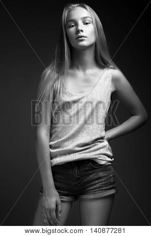 Fashion Model With Long Hair, Beautiful Eyes, Perfect Skin Is Posing In Studio For Glamour Test Phot