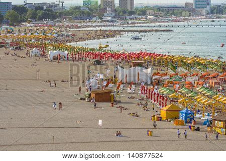 Mamaia Romania - July 18 2016:People enjoying on beach in Mamaia Mamaia is the best known resort on Romanian Riviera.It's situated on 8km long and 300m wide sandy land at the Black Sea.