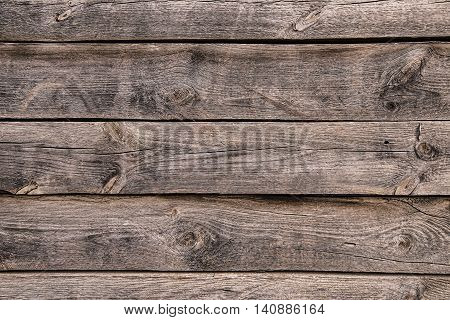 Brown wooden board texture or background with scratches