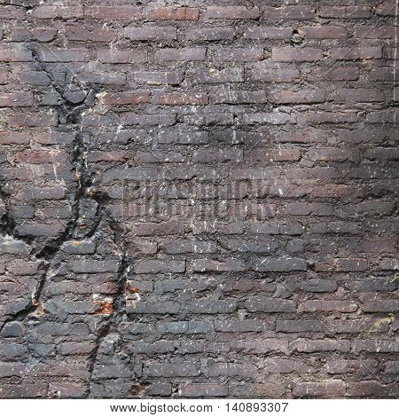 texture broken brick wall with a crack