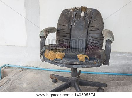 Black Office chair old damage leather and dirty time
