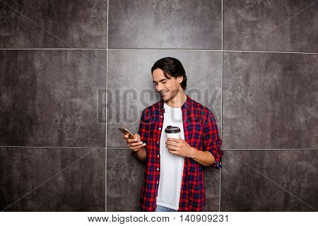 Happy Man Read Message On Phone And Drink Coffee