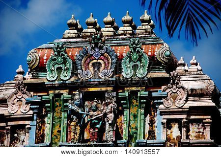 Singapore - December 21 2007: The Amalaka cushion-shaped finial atop the Gopuram Sikhara entrance tower to 1958-1983 Thendayuthapani Hindu Temple on Tank Road