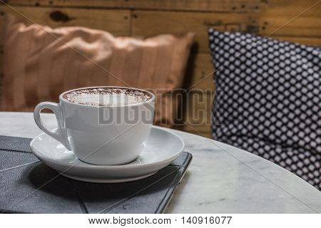 hot fresh coffee in white cup on marble table on tablet and white saucer cappuccino coffee mocha coffee espresso coffee latte coffee